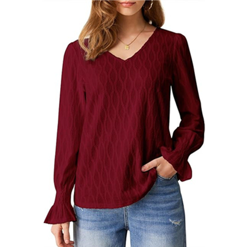 Dame V-hals bluse med unikt strukturdesign Stilla