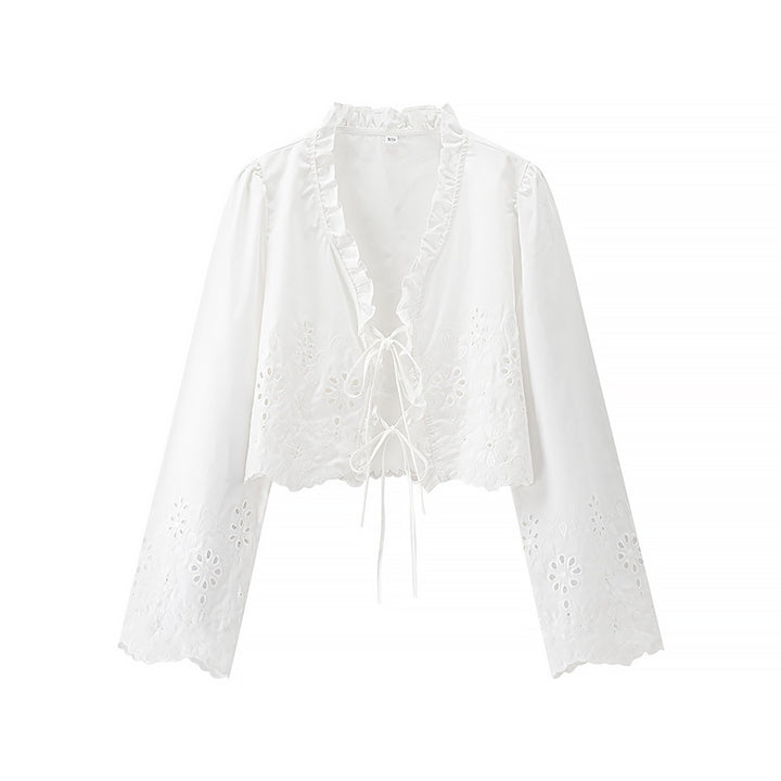 Damebluse med flæsedetaljer og floral broderi Stilla