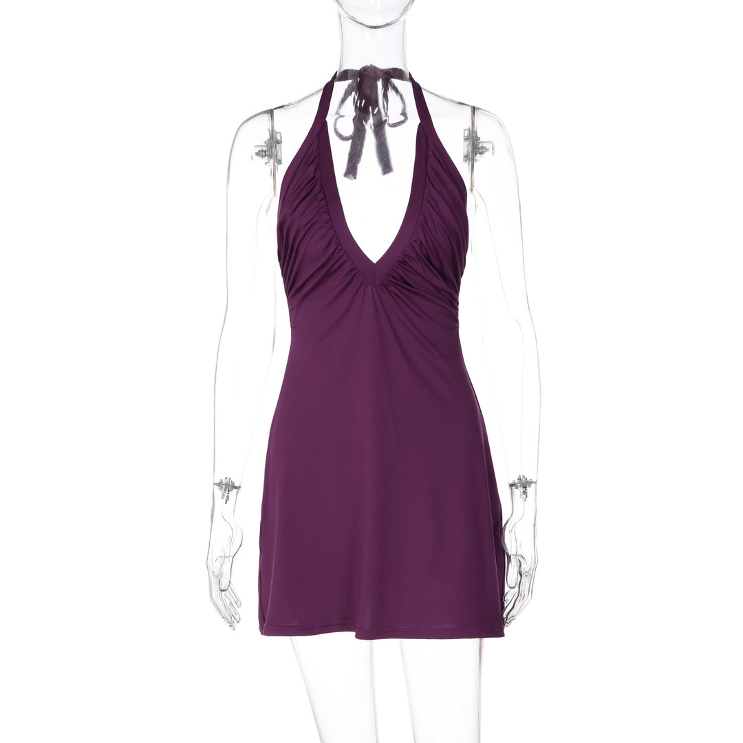 Dame strandkjole med alternativt halter-design og flatterende drapering Skovae