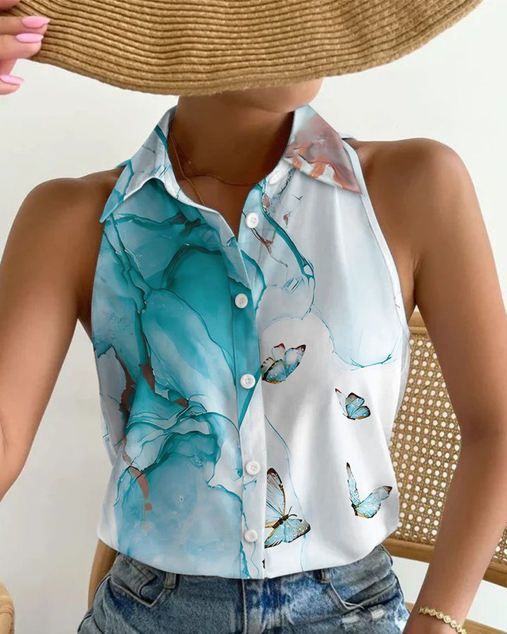 Damebluse med blomsterdesign og krageløs knapstolpe Stilla