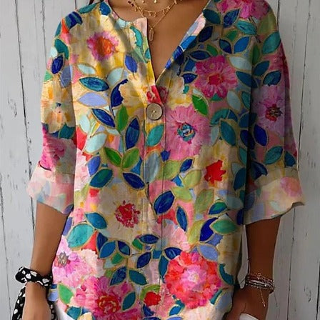 Damebluse med farverigt floralt mønster Stilla