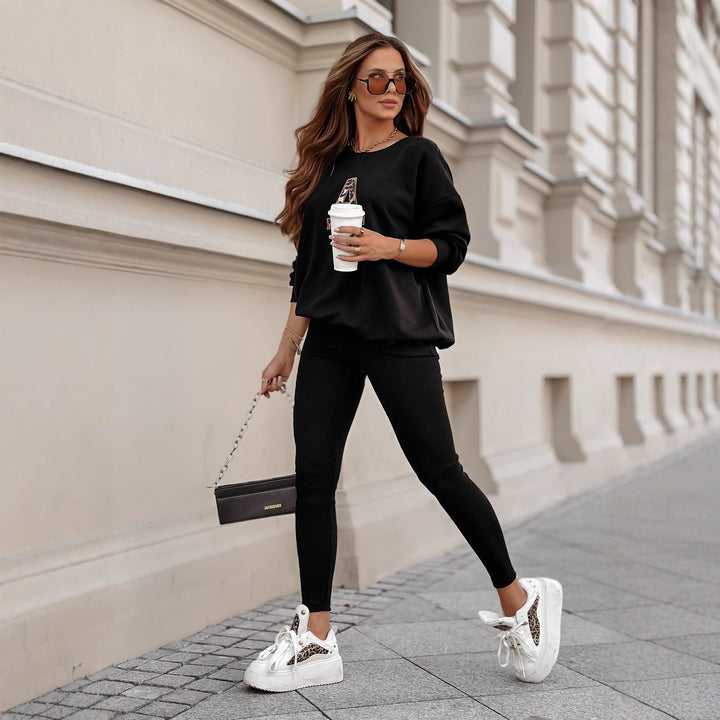 Dame afslappet sweatshirt med stort initial og afslappet pasform Stilla
