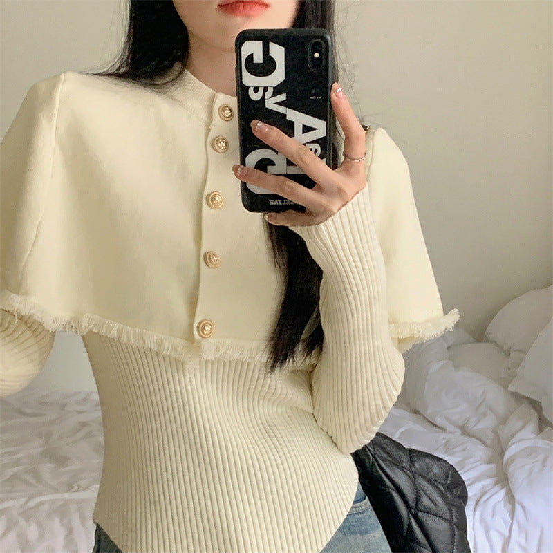 Kvinders fashionable sweater med aftageligt skulderafsnit og knapdetaljer Stilla