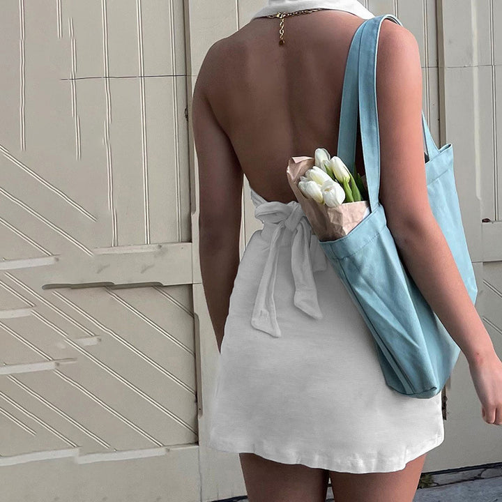 Dame cropped bluse med knaplukning og figursyet nederdel Stilla