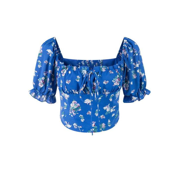 Damebluse med elastiske pufærmer og floralt design Stilla