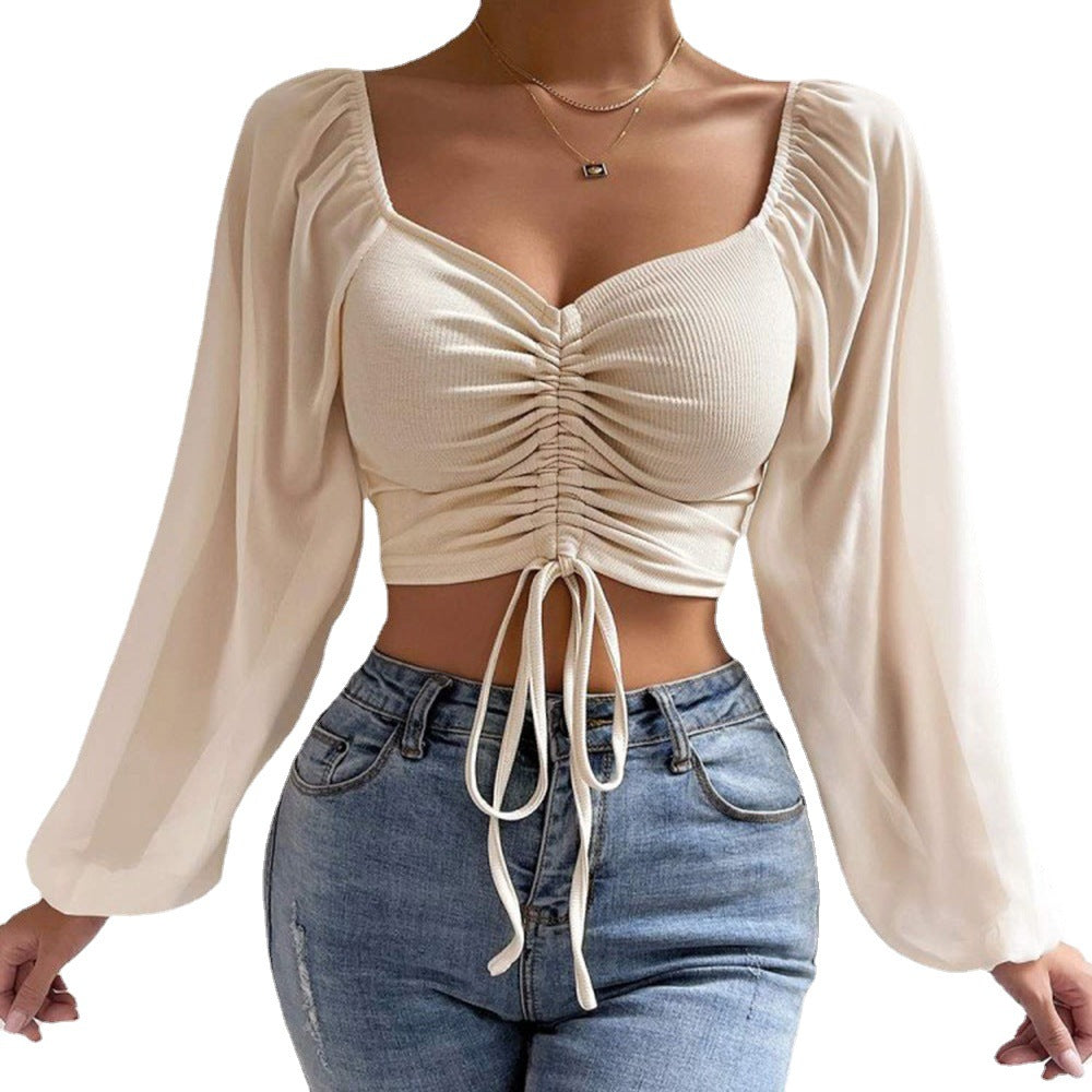 Damebluse med rynket design og ballonformede ærmer Stilla