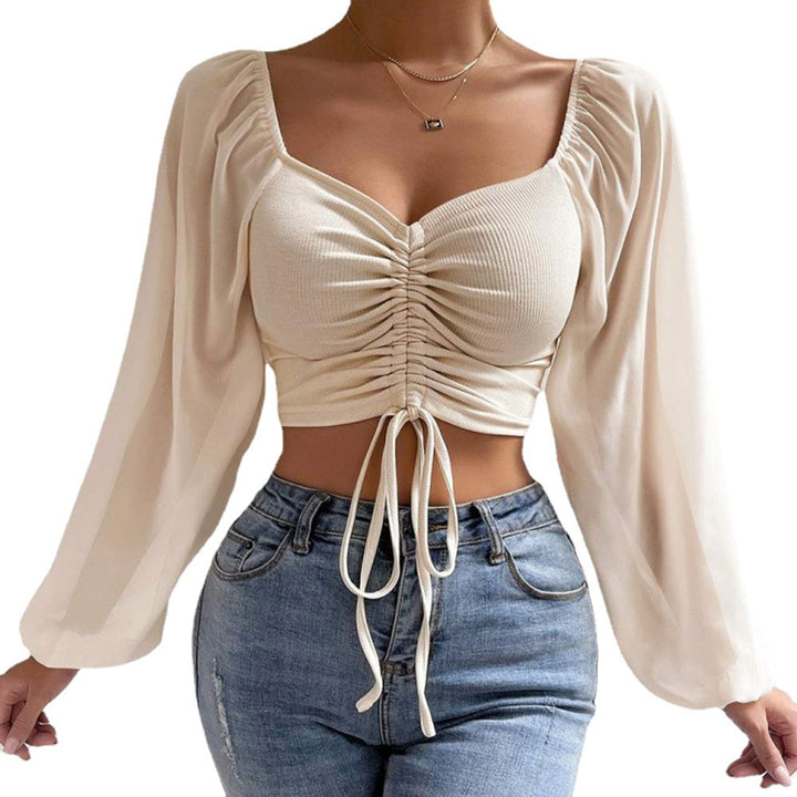 Damebluse med rynket design og ballonformede ærmer Stilla