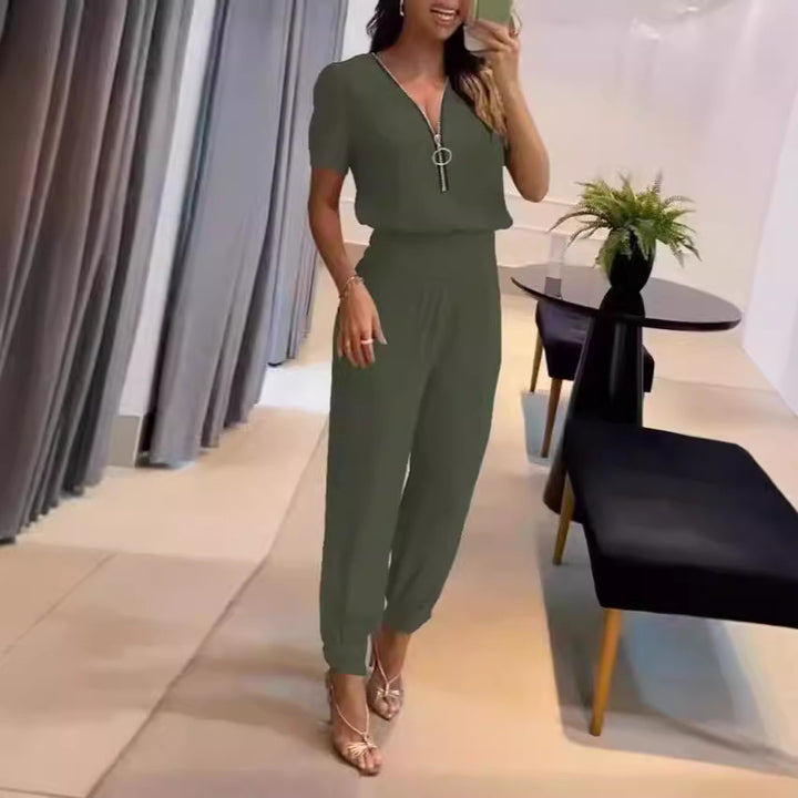 Dame jumpsuit med højhævet krave og sidelukning Skovae