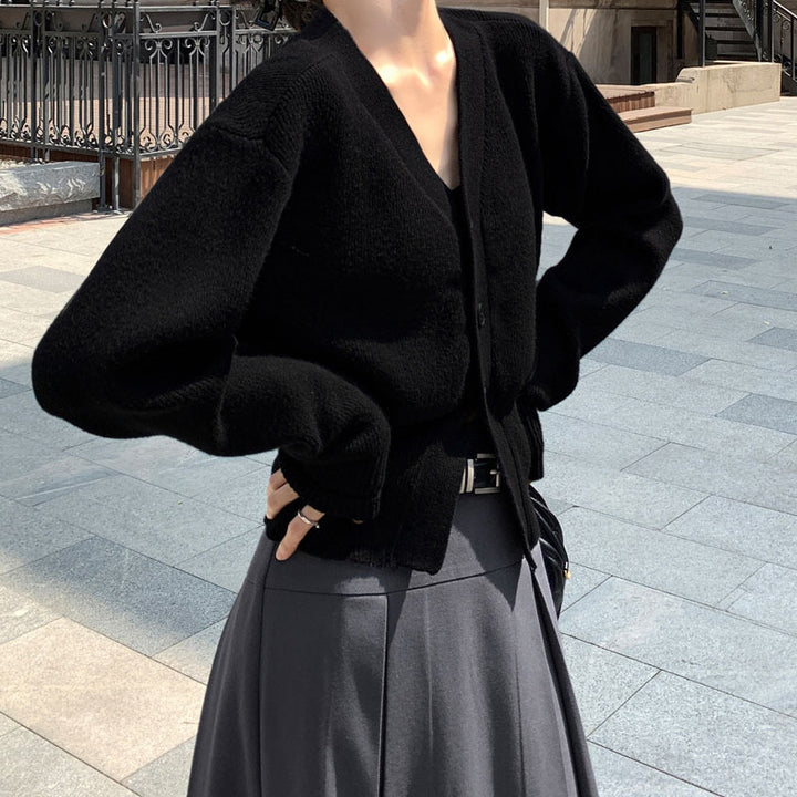 Femme Stilfuld Strikcardigan med Taljeret Snit Stilla