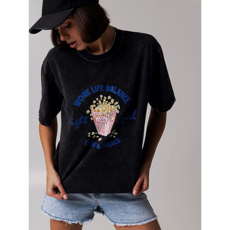 Dame T-shirt med grafisk popcorn-motiv og afslappet pasform Stilla