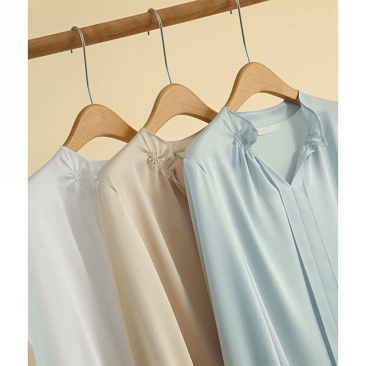Dame elegant bluse med ståkrave og detaljerede flæsedetaljer Stilla
