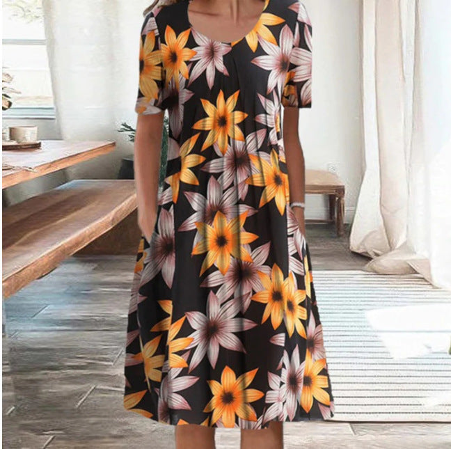 Dame fritidskjole med blomstret design og praktiske lommer Stiila
