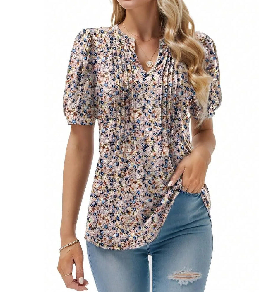Damebluse med flæseærmer og blomsterdesign Stilla