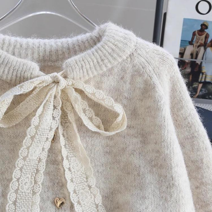 Kvinders hyggelige cardigan med hjerteknapdetaljer og bueaccent Stilla