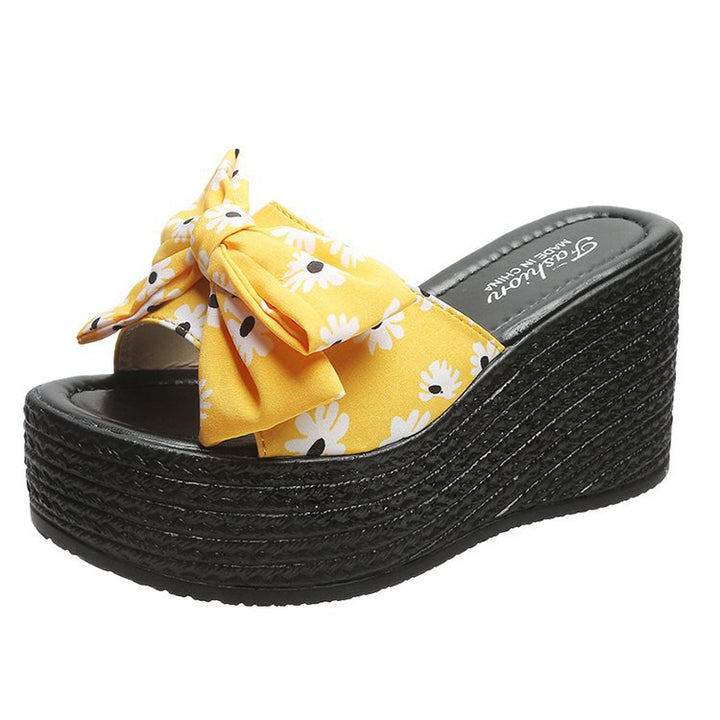 Dame plateau sandaler med legende sløjfe-design og florale accenter Stilla