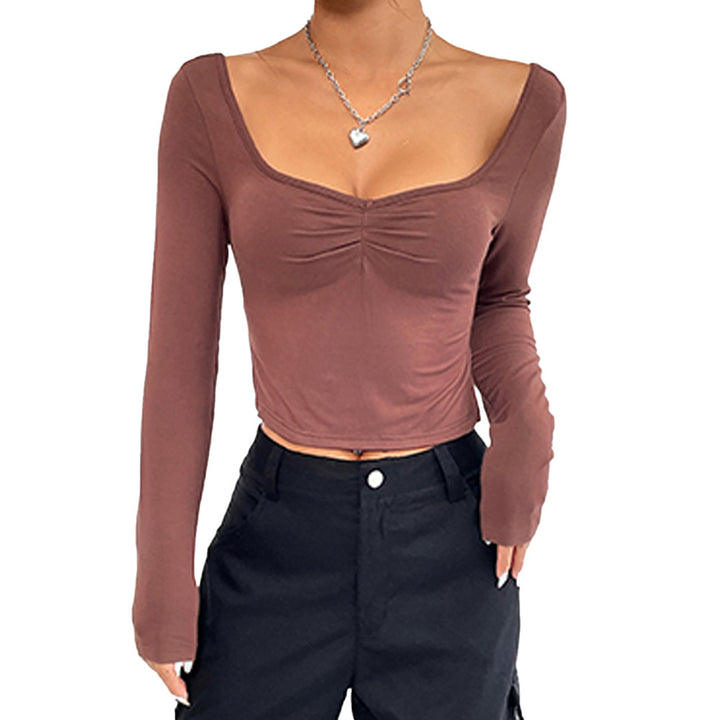 Kvindernes elegante langærmede crop top med stilfuld gathering effekt Stilla