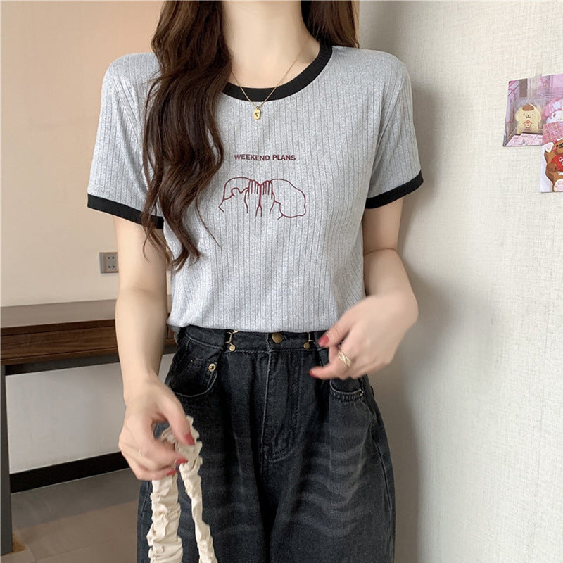 Femme Ribbed Graphic Tee med kontrasterende kanter Stilla