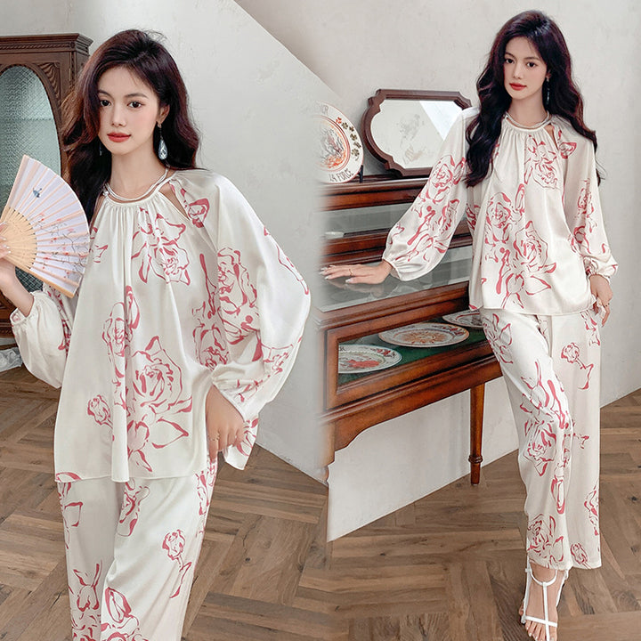 Dame let Pyjamasæt med floralt design og elegante detaljer Stilla