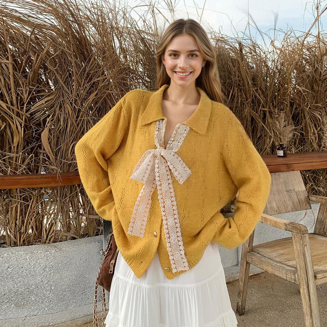 Kvinders strikket sweater med elegant sløjfe applikeret Stilla