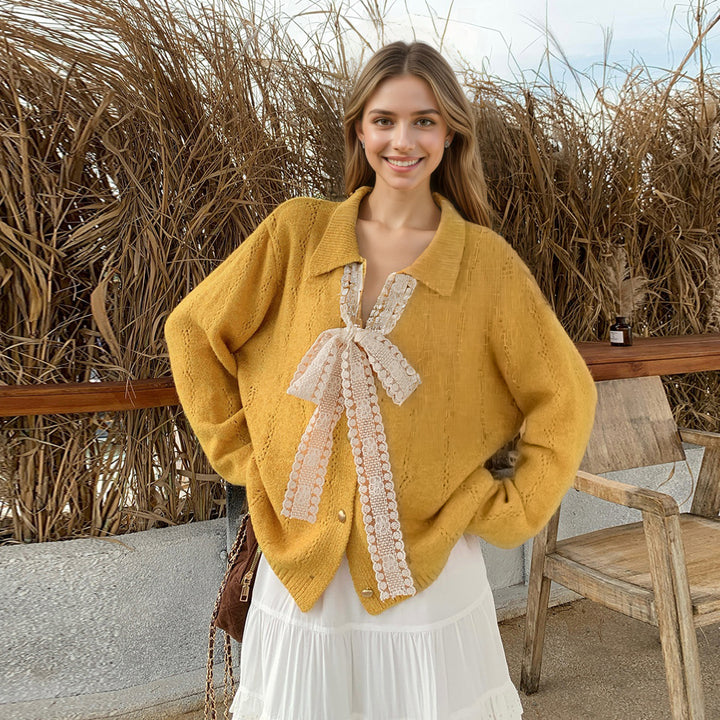 Kvinders strikket sweater med elegant sløjfe applikeret Stilla