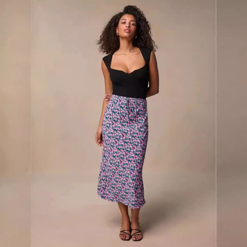 Dame Midirock med floral print og diskrete flæsedetaljer Stilla