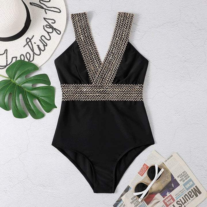 Dame one-piece badedragt med glamourøse kædeaccentuer Stilla