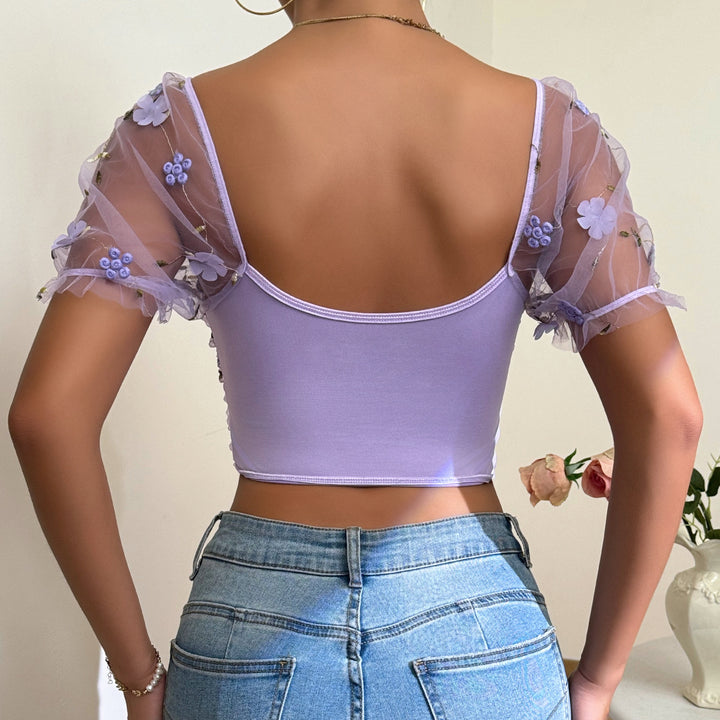 Damer elegant top med blomster-netærmer og flæsedetaljer Stilla