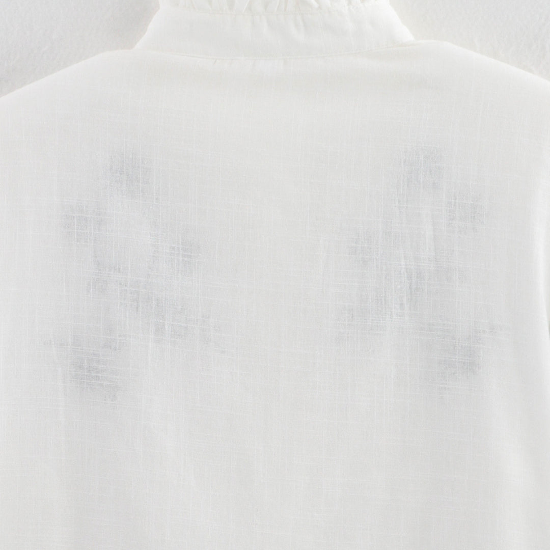 Damebluse med blomsterbroderi og høje pufærmer Stilla