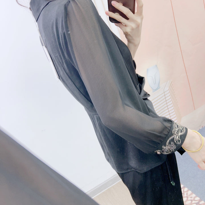 Dame Elegant og behagelig bluse med vide bukser Stilla