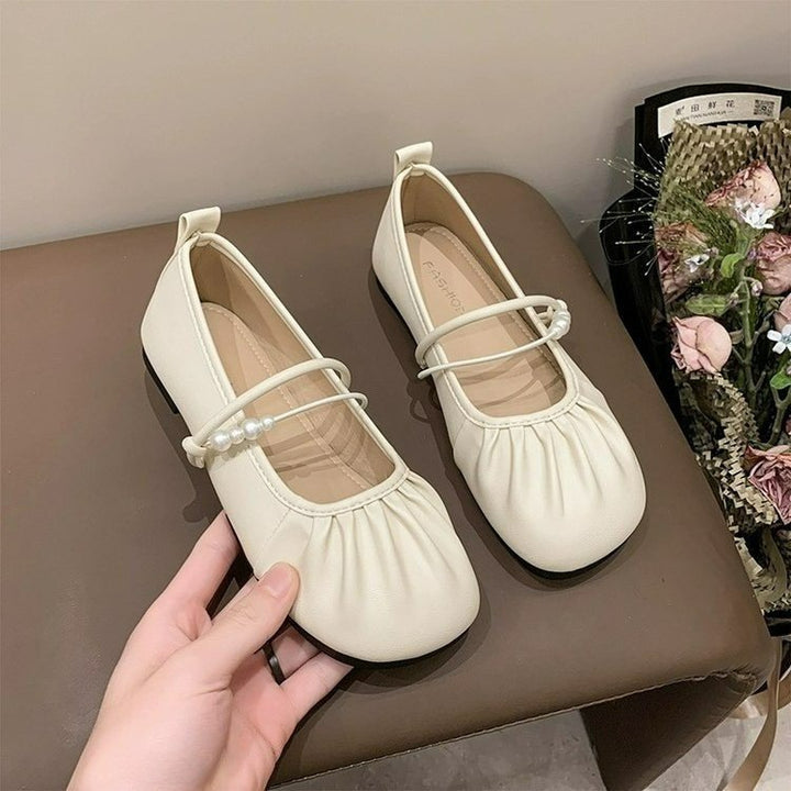 Dame ballerinaer med dekorativ rem og elegant perlepynt Stilla