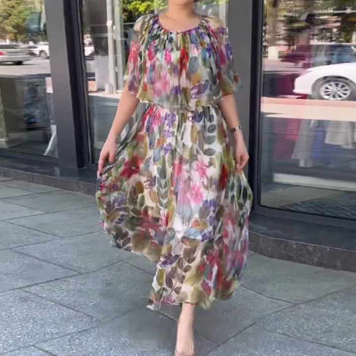 Dame Maxikjole med transparent blomsterdesign og elastisk talje Stilla