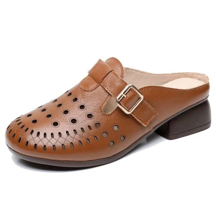 Dame Clogs med perforeret design og elegant spænde Stilla