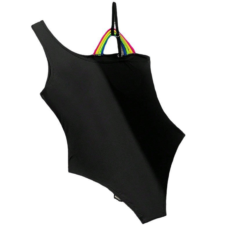 Dame one-shoulder swimsuit with colorful strap details Skovae