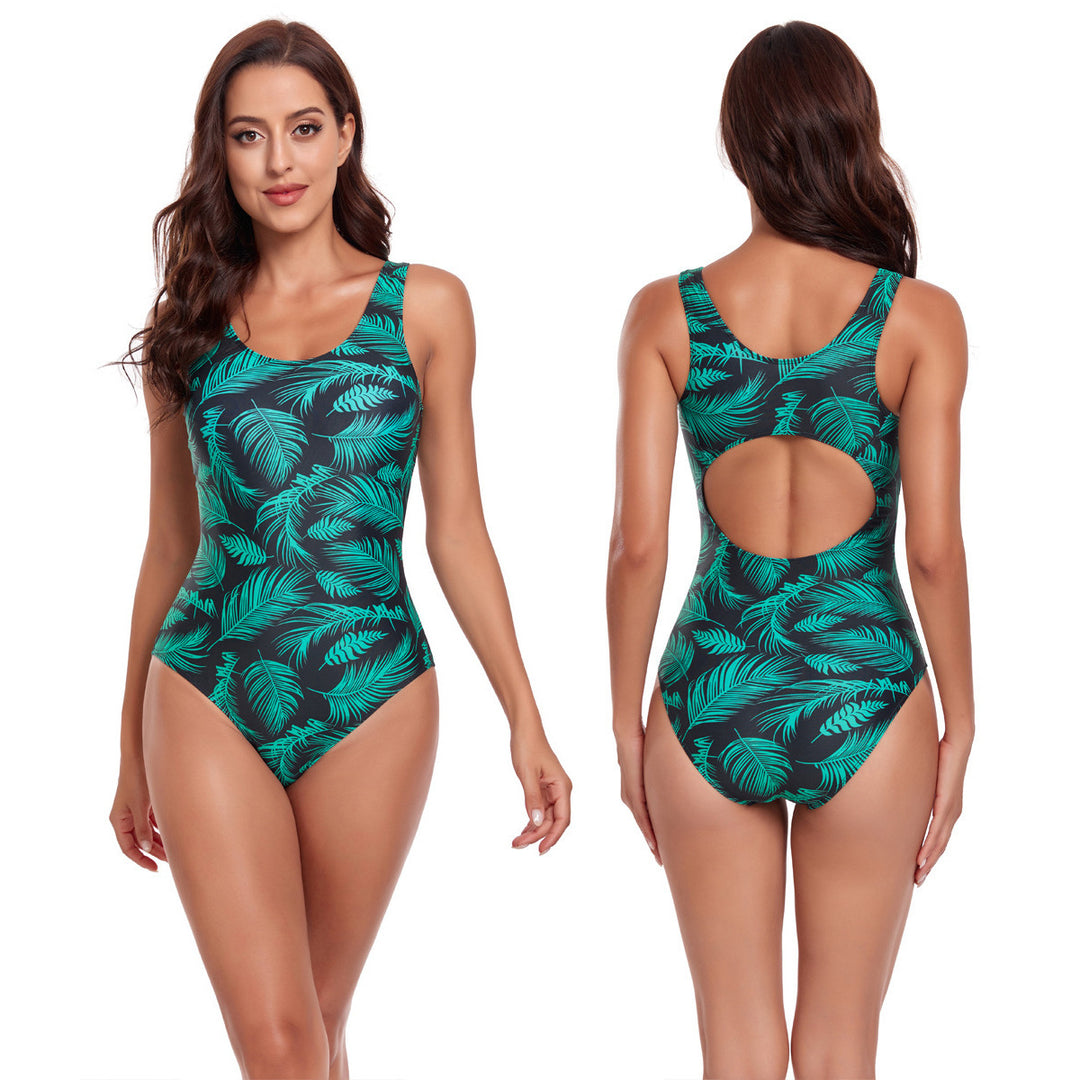 Dame one-piece badedragt med moderne tilbageudskæring og bladmønster Skovae