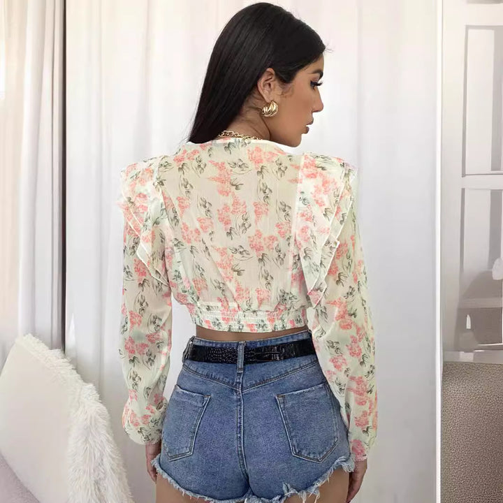Dame elegant bluse med blomsterdesign og flæsedetaljer Stilla