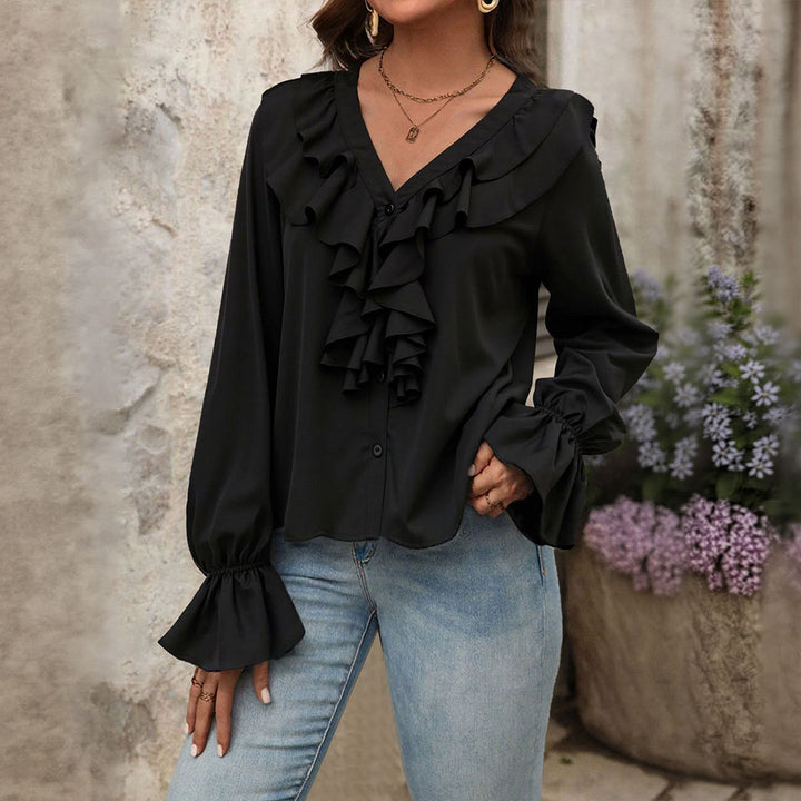 Kvinders bluse med elegante flæsedetaljer og chic V-hals Stilla