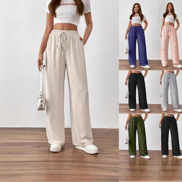 Dame bred linnedragt med elastisk bælt og sidelommer Stilla