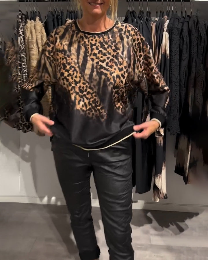 Dame top med moderigtige leopardmønster og dekorative ærmer Stilla