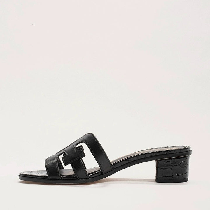 Dame mode slippers med elegant blokhæl og detaljeret designet overmateriale Stilla