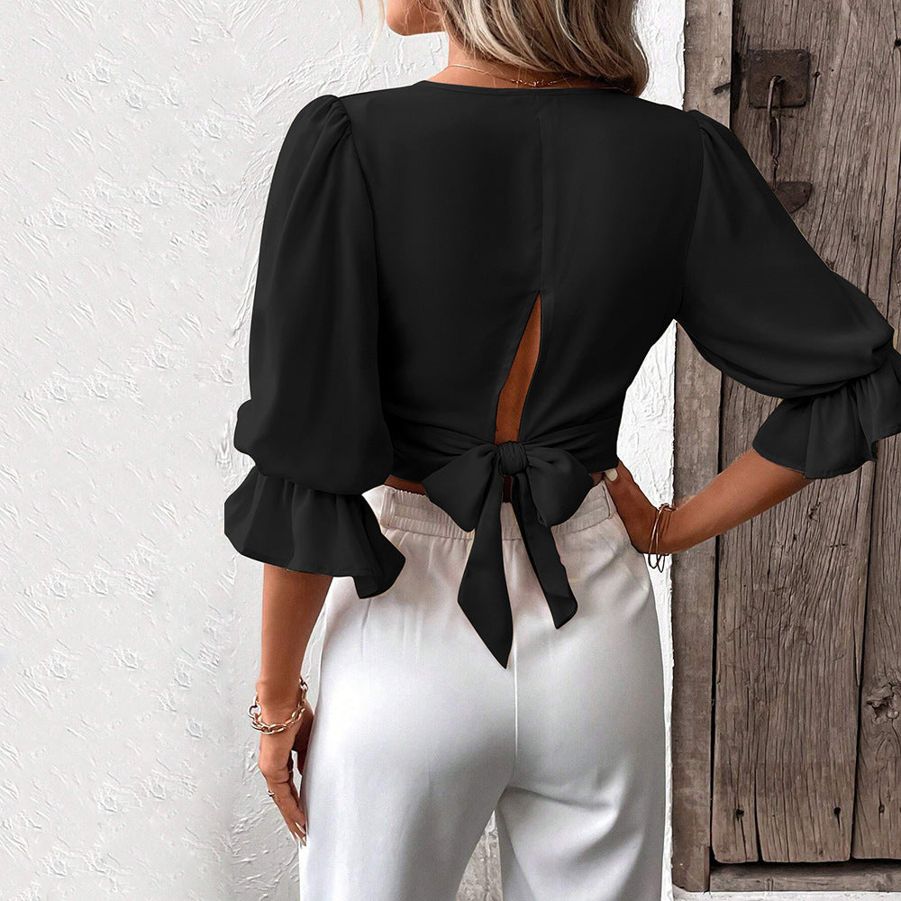 Damer chic crop top med elegante puffærmer og V-hals Stilla