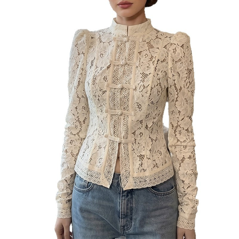 Dame spidsbluse med strukturerede detaljer og elegant ståkrave Skovae