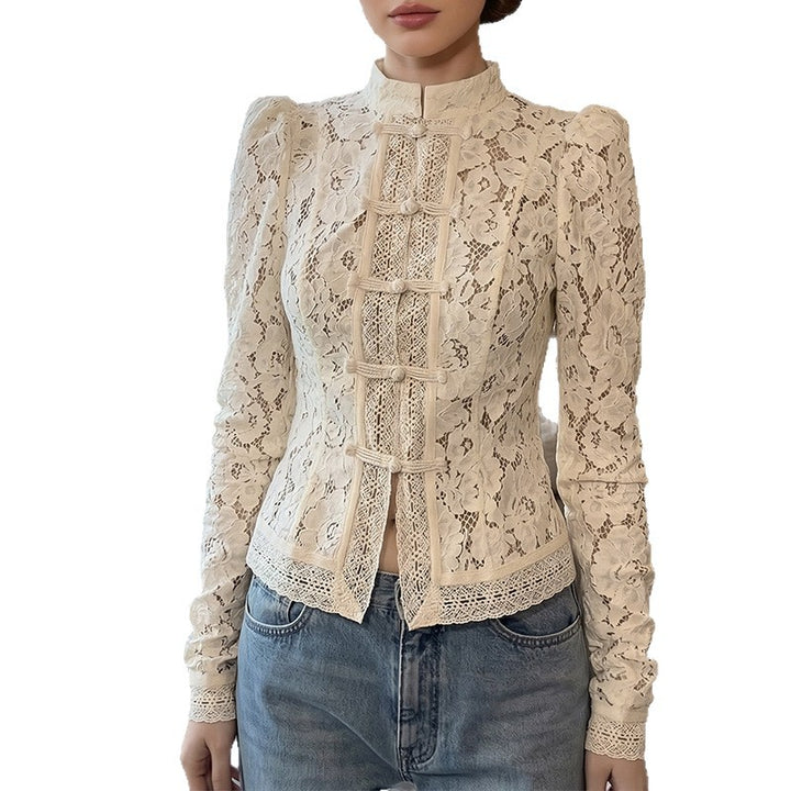 Dame spidsbluse med strukturerede detaljer og elegant ståkrave Skovae