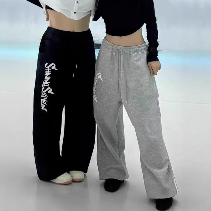 Kvinders casual joggingbukser med bred pasform og sportsgrafik Skovae