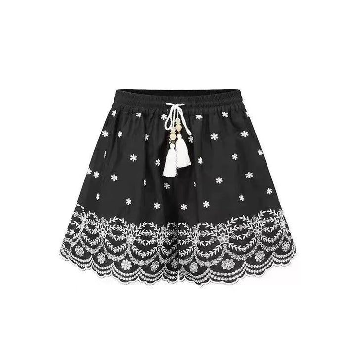 Dame plisseret nederdel med blomster broderi og elegant blonde Stilla