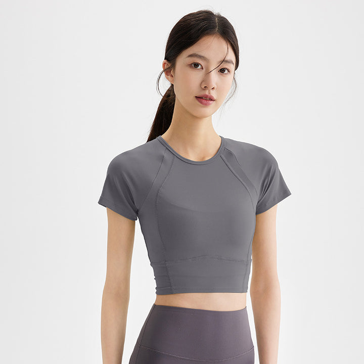 Dame sporty kortærmet crop-top med åndbare indsatser og elastisk pasform Stilla