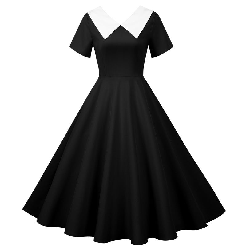 Kvindernes svingkjole med elegant krave og flagrende skirt Stilla