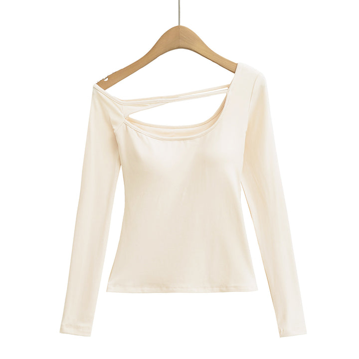 Dame langærmet top med innovativt cut-out-design og figursyet pasform Stilla