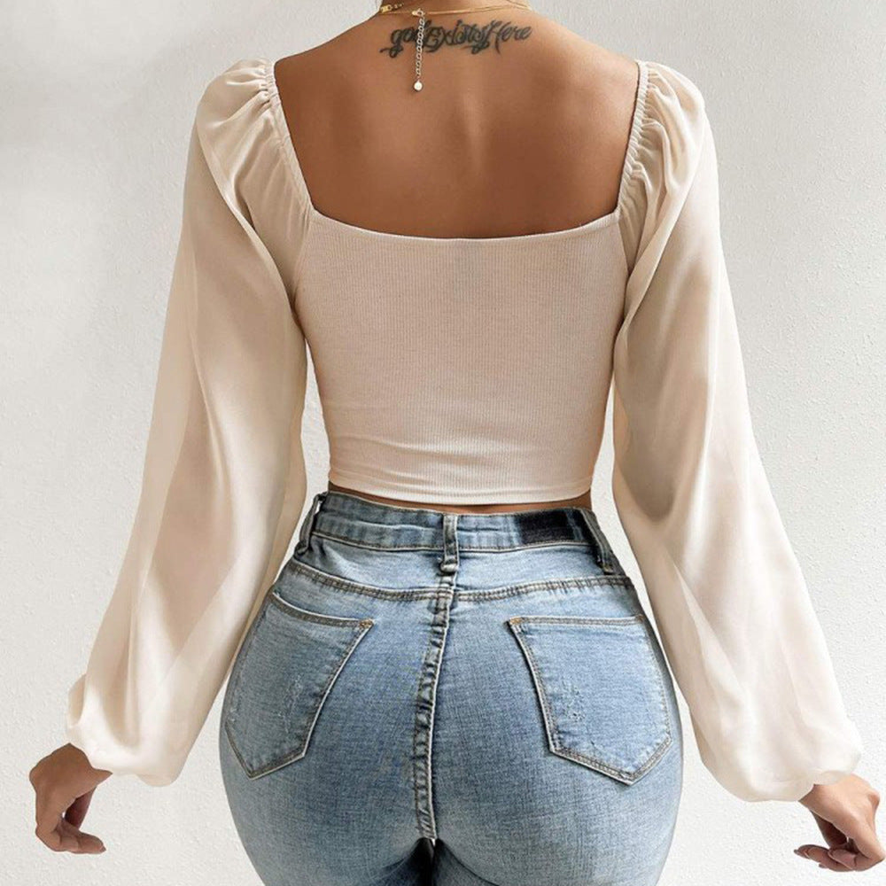 Damebluse med rynket design og ballonformede ærmer Stilla