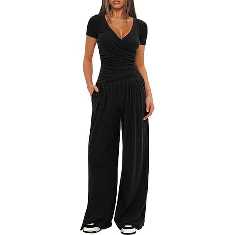 Dame afslappet jumpsuit med omslagsdesign og bredt ben Skovae