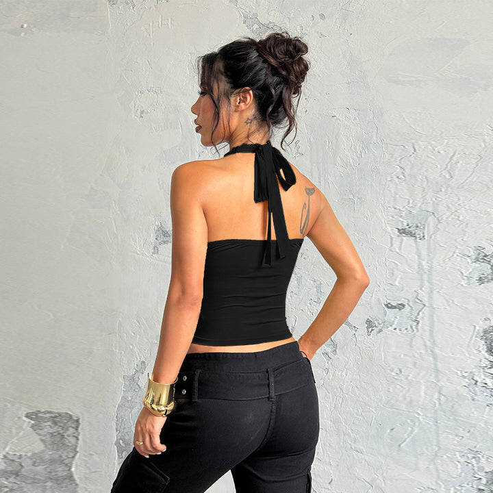 Dame elegant halterneck top med delikat spidsdetail Skovae